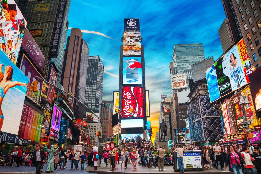 Times Square with tourists on May 11, 2013. Iconified as The Crossroads of the World it's the brightly illuminated hub of the Broadway Theater District.953