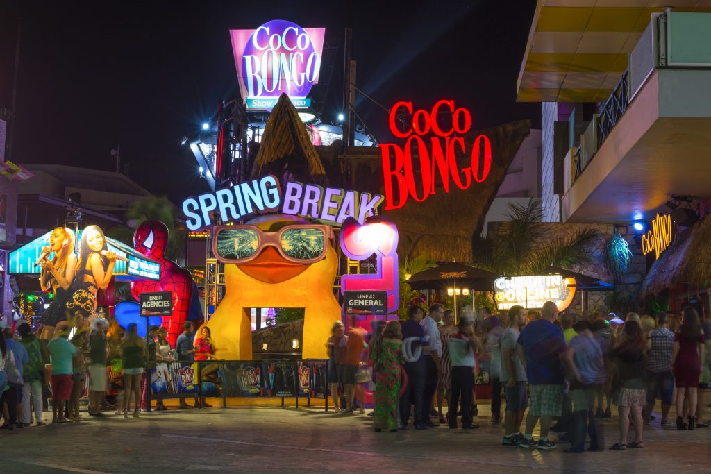 Cancun, Mexico - February 28, 2017: Tourists stand in long lines to enter the popular Conco Bongo nightclub in Cancun at the start of Spring Break